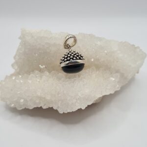 Dije plata y piedra