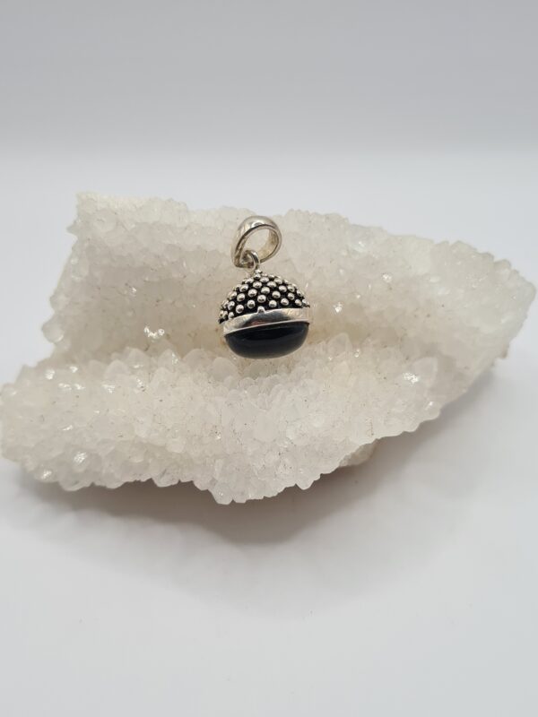 Dije plata y piedra