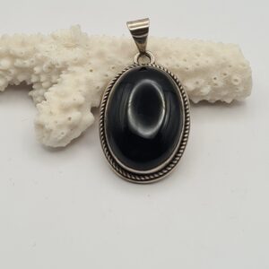 Dije plata y piedra