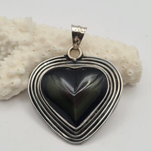 Dije plata y piedra