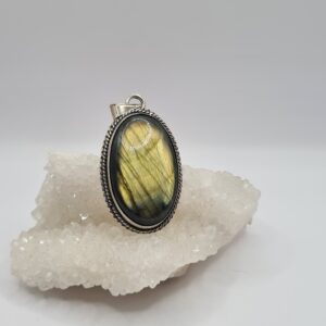Dije plata y piedra