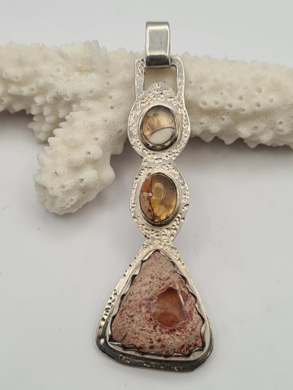 Dije plata y piedra