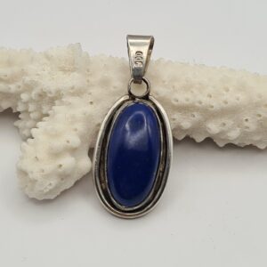 Dije plata y piedra