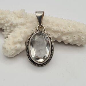 Dije plata y piedra
