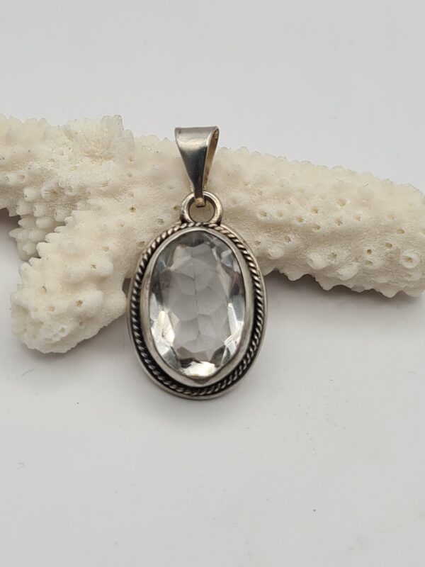 Dije plata y piedra