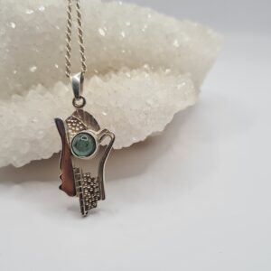 Dije plata y piedra