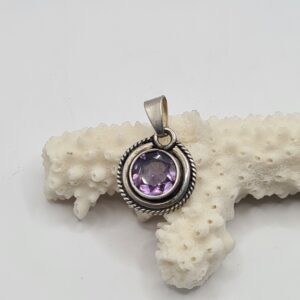 Dije plata y piedra